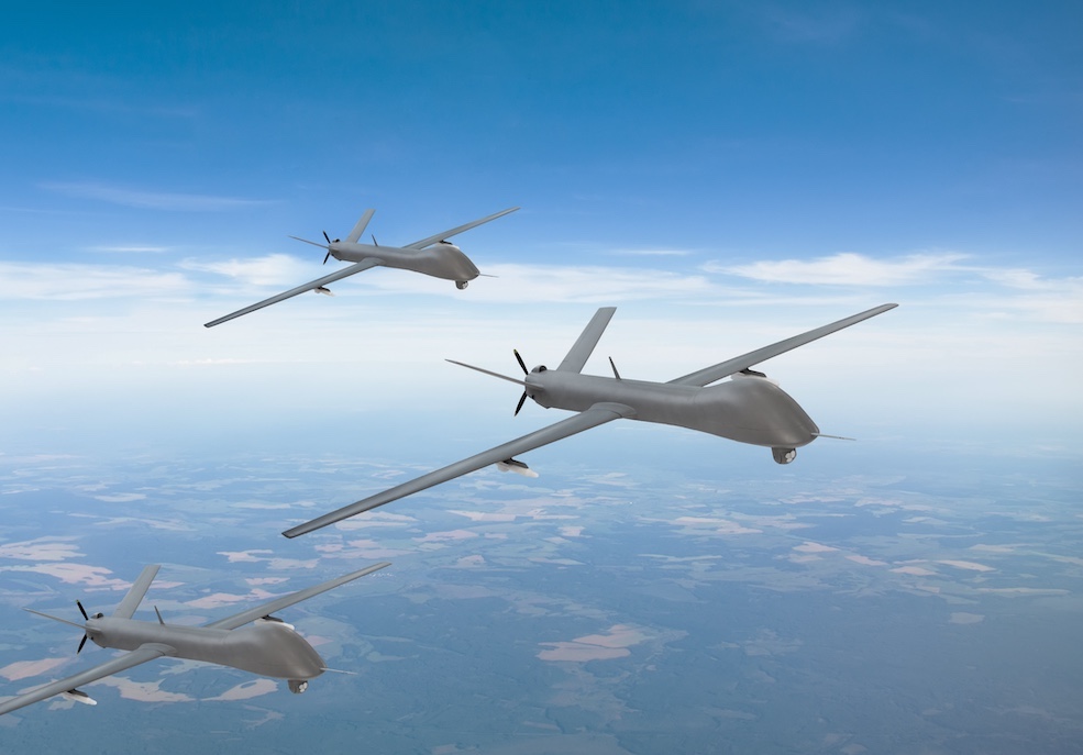 The group of unmanned aerial vehicles in the sky over the territory of patrol